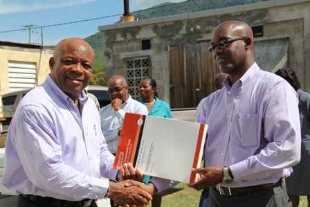 (L-R) Advisor to the Minister of Health Mr. Hensley Daniel received donation from President of the St. Kitts Rotary Club Mr. Earl Kelly. The gift came from the Hackettstown Medical Centre in New Jersey and the Hackettstown Rotary Club through the St. Kitts Rotary Club